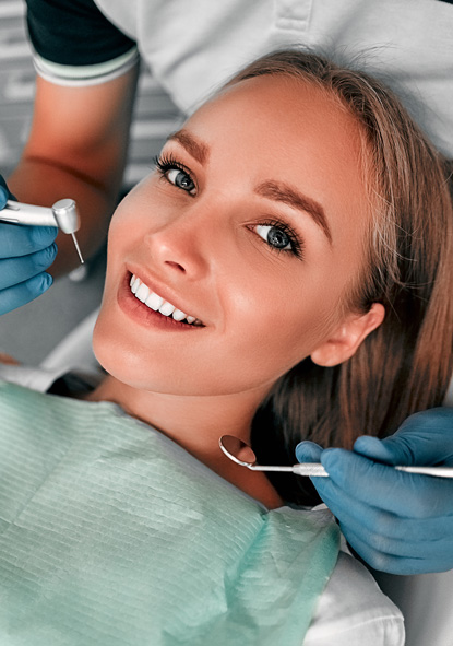 Patient receiving professional teeth cleaning as part of general dentistry services at Corona Family Dental in Sarasota and Bradenton FL.